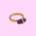Ascendancy Gems gold ring with a double-terminated amethyst crystal set horizontally. Adjustable band.