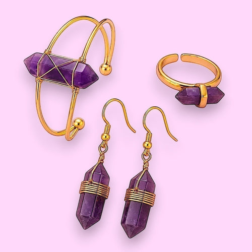 Ascendancy Gems Celestial Amethyst Collection: gold-tone bracelet, ring, and earrings with purple amethyst crystal points.
