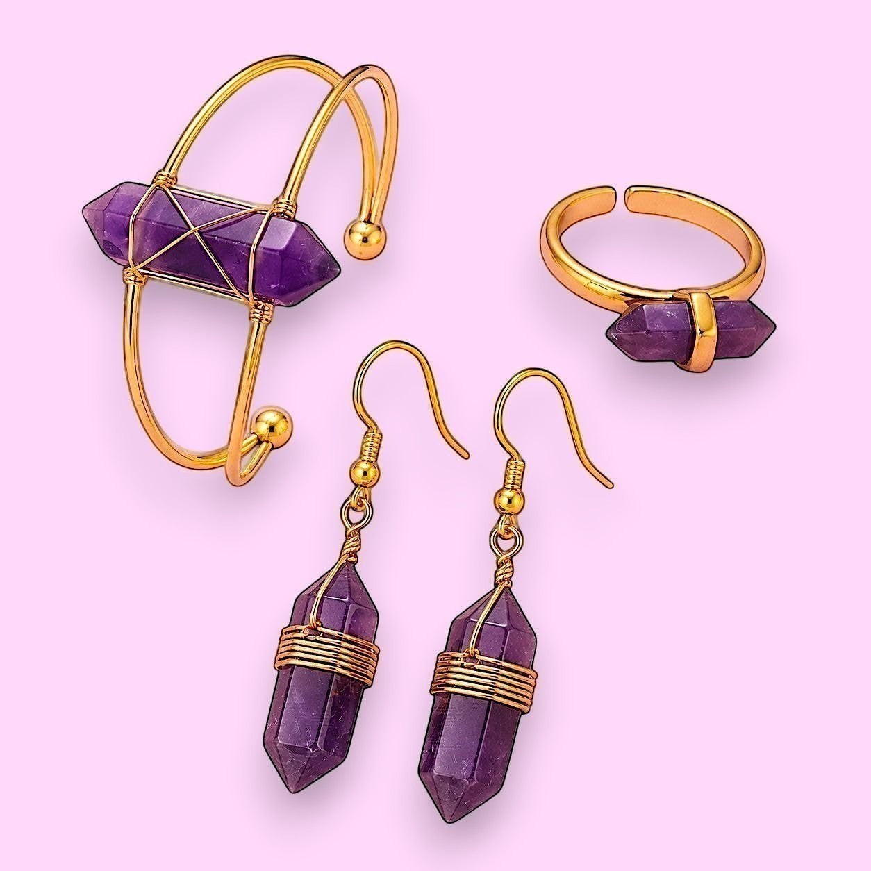 Ascendancy Gems Celestial Amethyst Collection: gold-tone bracelet, ring, and earrings with purple amethyst crystal points.