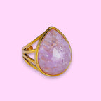 Ascendancy Gems gold-filled ring with a large, multifaceted teardrop amethyst gemstone. Elegant, modern design.