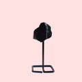 Ascendancy Gems black obsidian raw crystal on minimalist metal stand, approx. 4 inches tall, for home décor.
