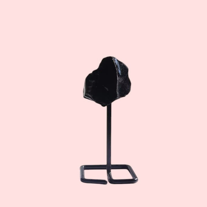 Ascendancy Gems black obsidian raw crystal on minimalist metal stand, approx. 4 inches tall, for home décor.