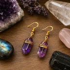 Ascendancy Gems Celestial Amethyst Earrings with gold wire-wrapped purple amethyst points.