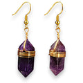 Ascendancy Gems Celestial Amethyst Earrings with gold wire wrap and gold hooks. Features faceted purple amethyst gemstones.