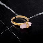 Ascendancy Gems Celestial Rose Quartz Ring featuring a natural pink crystal point on an adjustable gold-tone band.