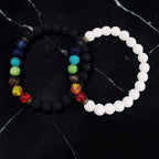 Ascendancy Gems Shakra Lava bead bracelets with black and white lava stones and colorful chakra beads.