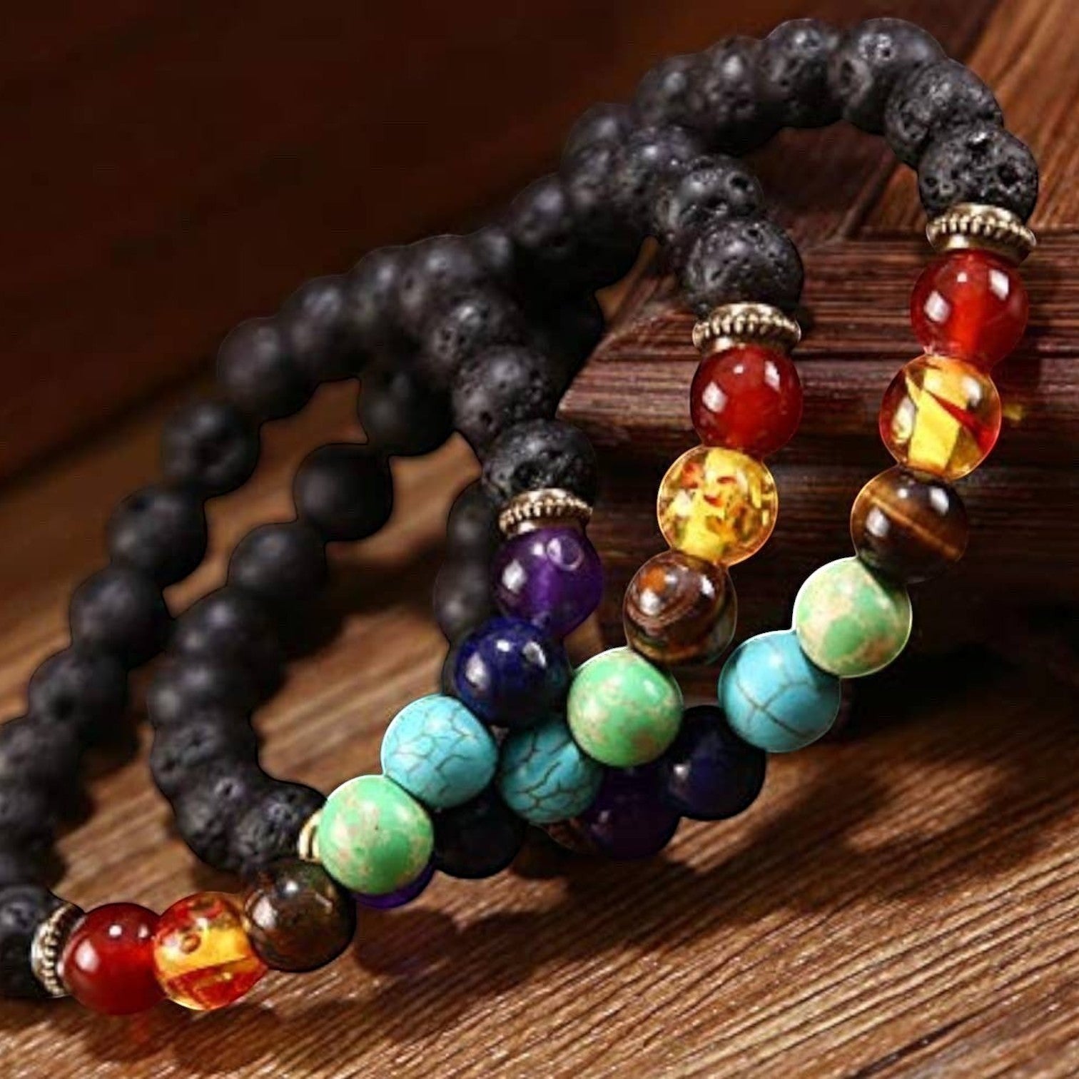 Ascendancy Gems Shakra Lava bead bracelets with natural black lava stone and colorful 7 chakra gemstones for aromatherapy and balance.