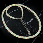 Ascendancy Gems handcrafted Ethiopian Welo fire opal bead necklace with rainbow play-of-color and adjustable chain.