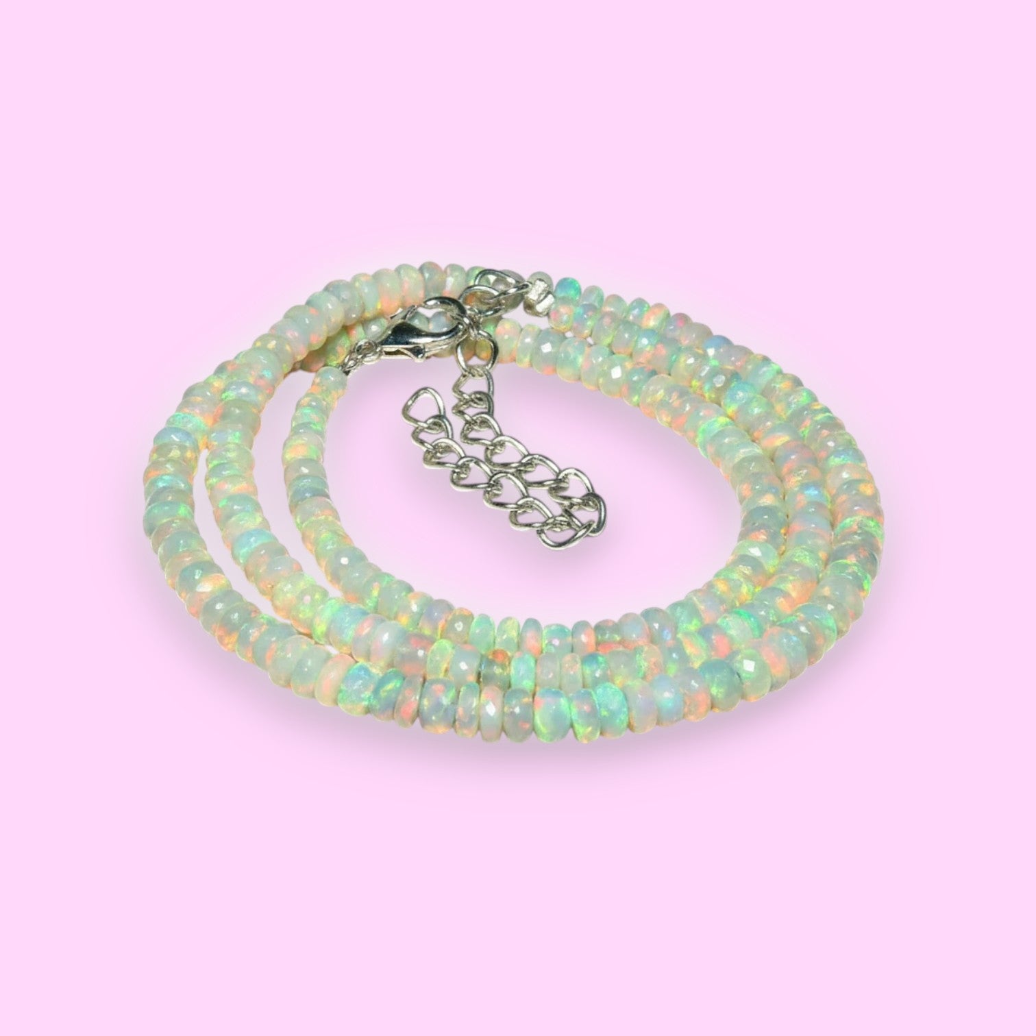 Ascendancy Gems handcrafted Ethiopian Welo fire opal bead necklace with rainbow play-of-color and adjustable chain.