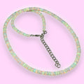 Ascendancy Gems handcrafted Ethiopian Welo fire opal bead necklace with rainbow play-of-color and adjustable chain.