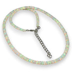 Ascendancy Gems handcrafted Ethiopian Welo fire opal bead necklace with rainbow play-of-color and adjustable chain.