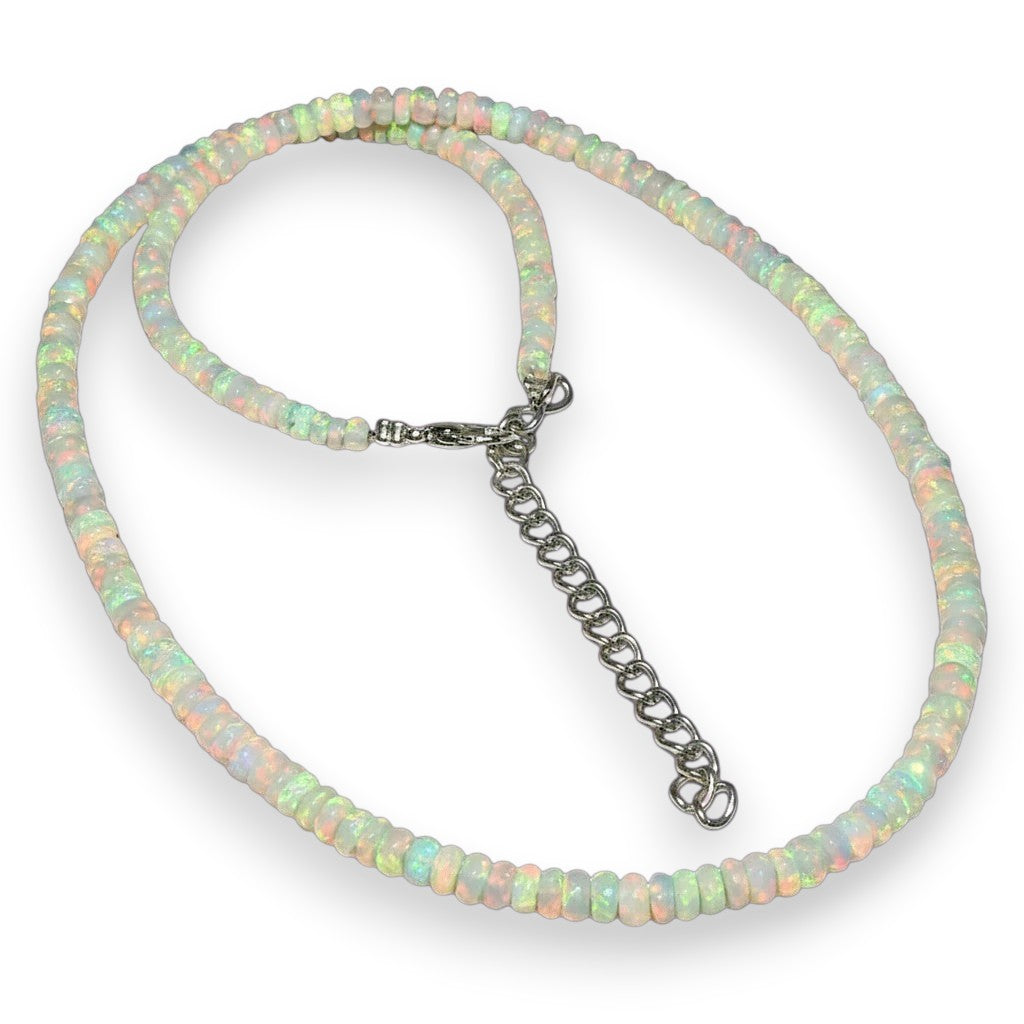 Ascendancy Gems handcrafted Ethiopian Welo fire opal bead necklace with rainbow play-of-color and adjustable chain.
