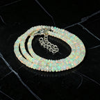 Ascendancy Gems handcrafted necklace featuring genuine Ethiopian Welo fire opal beads with vibrant rainbow play-of-color.