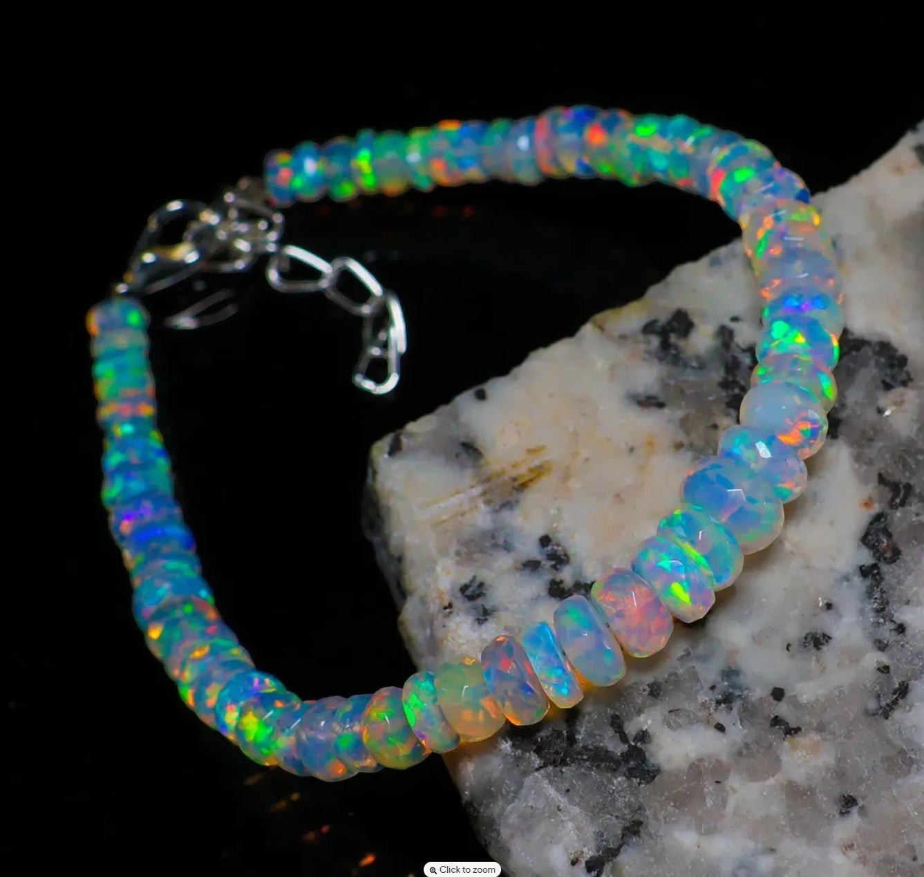 Ascendancy Gems handcrafted Ethiopian Welo opal bead bracelet featuring vibrant rainbow fire and adjustable clasp.