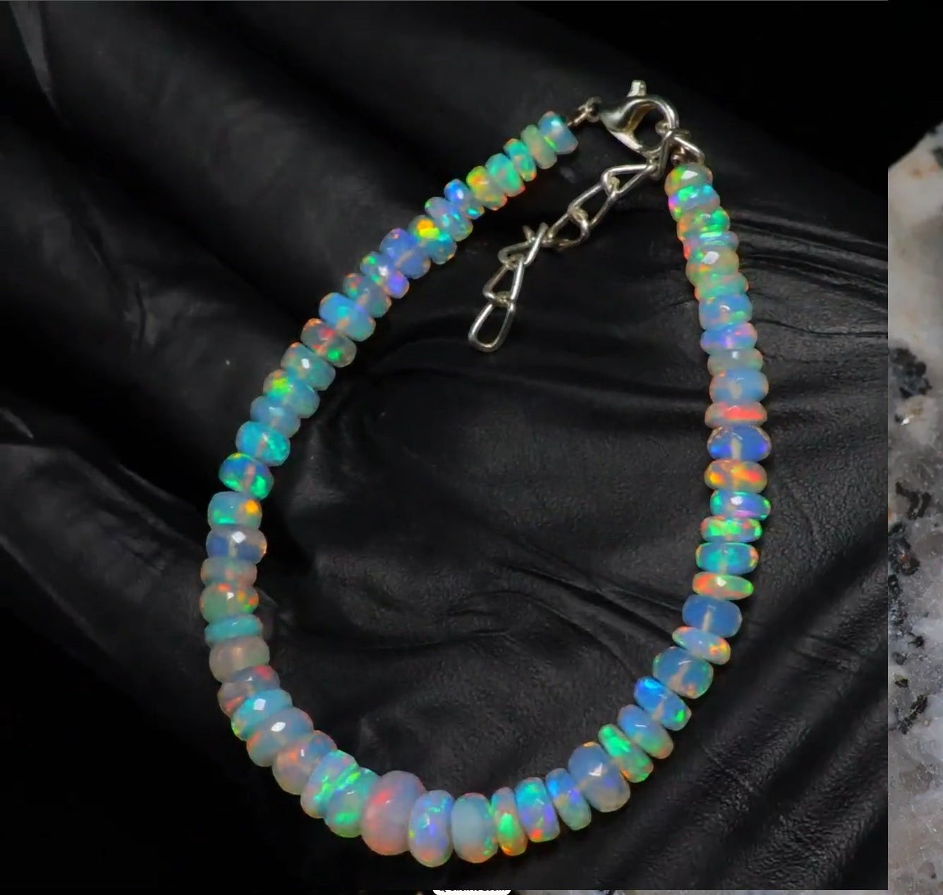 Ascendancy Gems handcrafted Ethiopian Welo opal bracelet with rainbow fire beads and adjustable silver clasp.