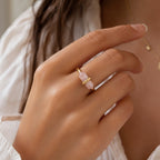 Ascendancy Gems gold-filled ring with a double-point rose quartz crystal wand on an adjustable band.