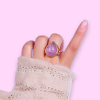 Ascendancy Gems gold-filled ring with a multifaceted teardrop amethyst gemstone. Elegant design for everyday wear.