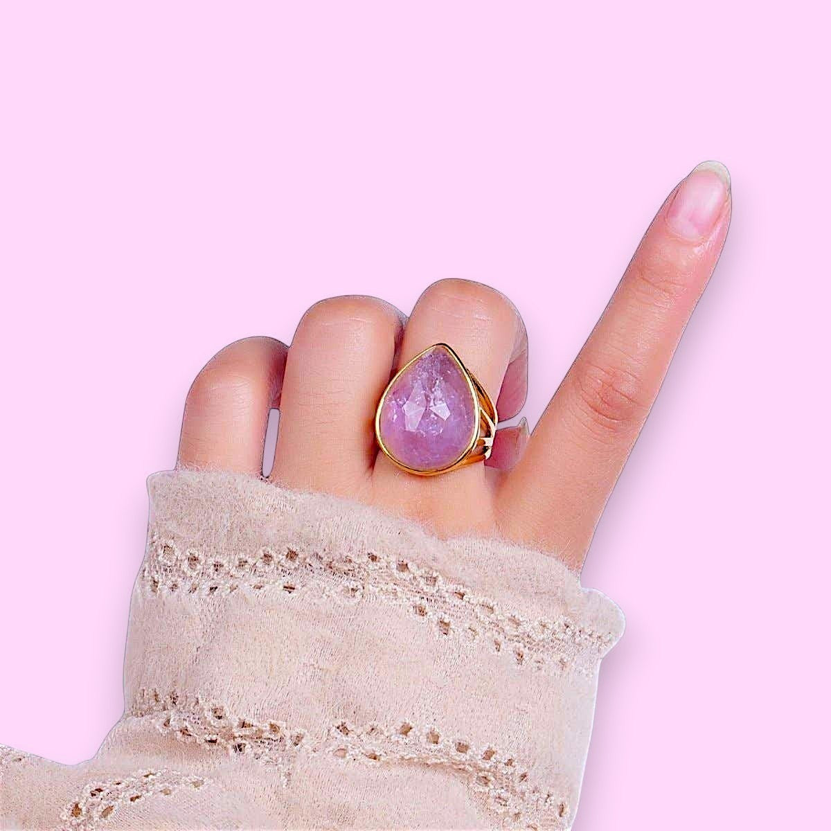 Ascendancy Gems gold-filled ring with a multifaceted teardrop amethyst gemstone. Elegant design for everyday wear.