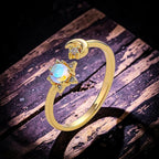 Ascendancy Gems gold plated adjustable ring with a moonstone center, star setting, and crescent moon accent.