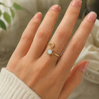 Ascendancy Gems gold plated sterling silver adjustable ring with moonstone center, star setting, and crescent moon accent.