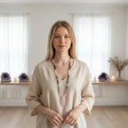 Woman wearing an Ascendancy Gems mala necklace with Tiger Eye, Amethyst, Rose Quartz, and Rhodonite beads and pendant.