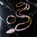 Ascendancy Gems mala necklace and bracelet set with Tiger Eye, Amethyst, Rose Quartz, and Rhodonite beads.