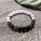 Ascendancy Gems Awakening Mala Set: White Howlite, Black Onyx, and White Quartz beaded bracelet.