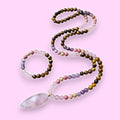 Ascendancy Gems mala necklace and bracelet set with Tiger Eye, Amethyst, Rose Quartz, and Rhodonite beads.