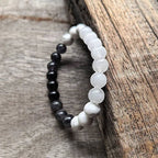 Ascendancy Gems Awakening Mala Set: White Howlite, Black Onyx, and White Quartz beaded bracelet.