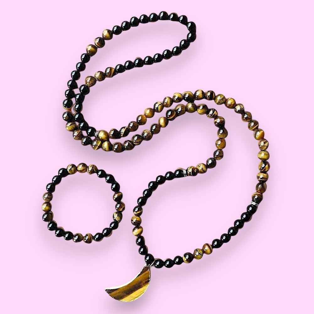 Ascendancy Gems mala necklace and bracelet set with black onyx and tiger eye beads and a tiger eye moon pendant.
