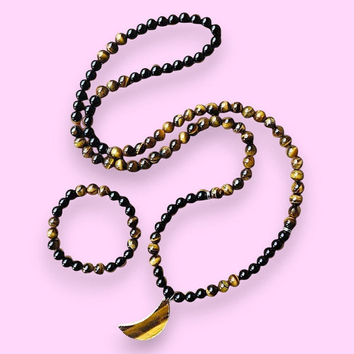 Ascendancy Gems mala necklace and bracelet set with black onyx and tiger eye beads and a tiger eye moon pendant.
