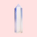 Ascendancy Gems polished opalite crystal tower, 3" obelisk with blue and peach tones, smooth finish, ideal for decor and meditation.