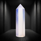 Ascendancy Gems polished opalite crystal tower, 3", luminous with blue and peach tones, obelisk shape for meditation and decor.