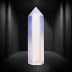 Ascendancy Gems polished opalite crystal tower, 3", luminous with blue and peach tones, obelisk shape for meditation and decor.