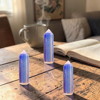 Ascendancy Gems polished opalite crystal tower, 3", luminous blue and peach tones, obelisk shape, for meditation and decor.