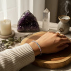 Ascendancy Gems one-of-a-kind purple smoked opal beaded bracelet with flashes of green, orange, red, and blue fire.