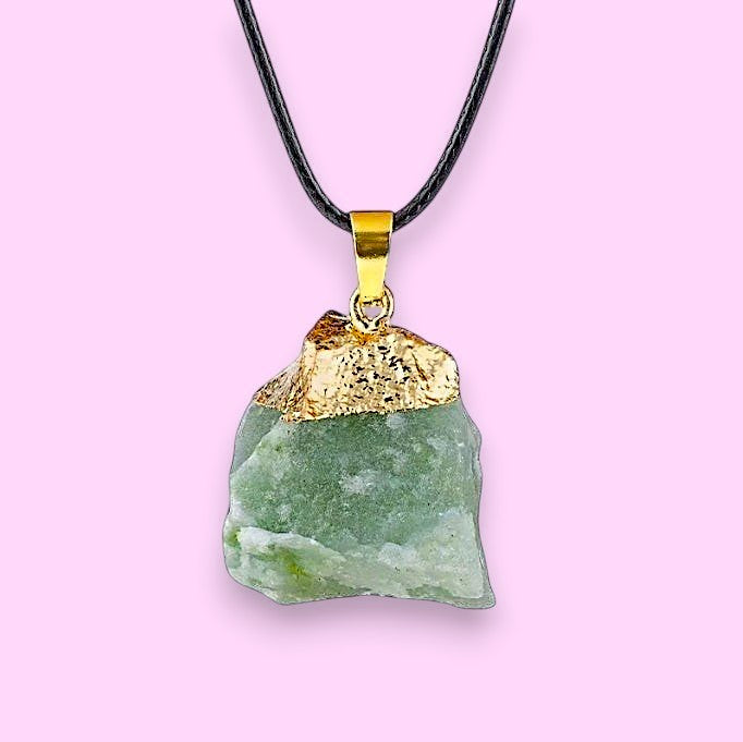 Ascendancy Gems raw green aventurine crystal necklace with gold cap and black cord. Natural, irregular shape.