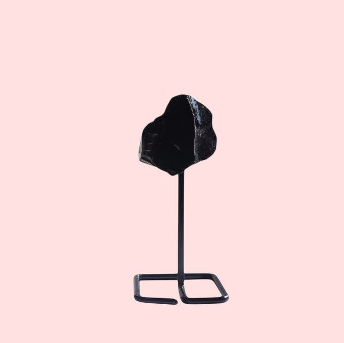 Ascendancy Gems raw black obsidian crystal on a minimalist metal stand, approx. 4 inches tall.