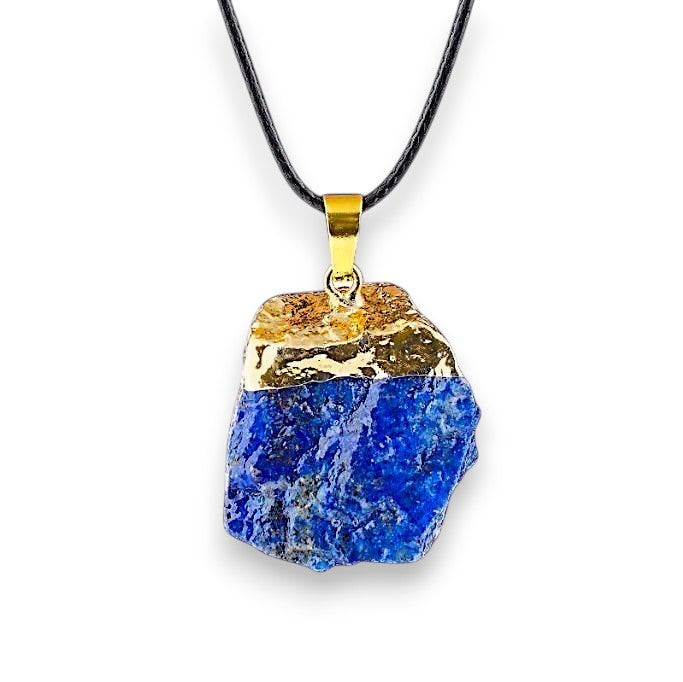 Ascendancy Gems raw lapis lazuli crystal necklace with gold cap and black cord. Natural, irregular shape.