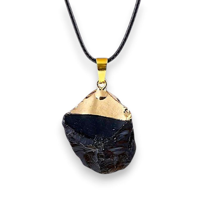 Ascendancy Gems raw black obsidian crystal necklace with gold cap and leather cord. Natural, irregular shape.