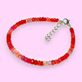 Ascendancy Gems handcrafted bracelet with faceted red Ethiopian Welo fire opal rondelle beads and silver clasp.
