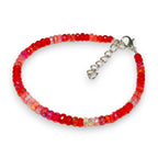 Ascendancy Gems handcrafted bracelet with faceted red Ethiopian Welo fire opal rondelle beads and silver clasp.