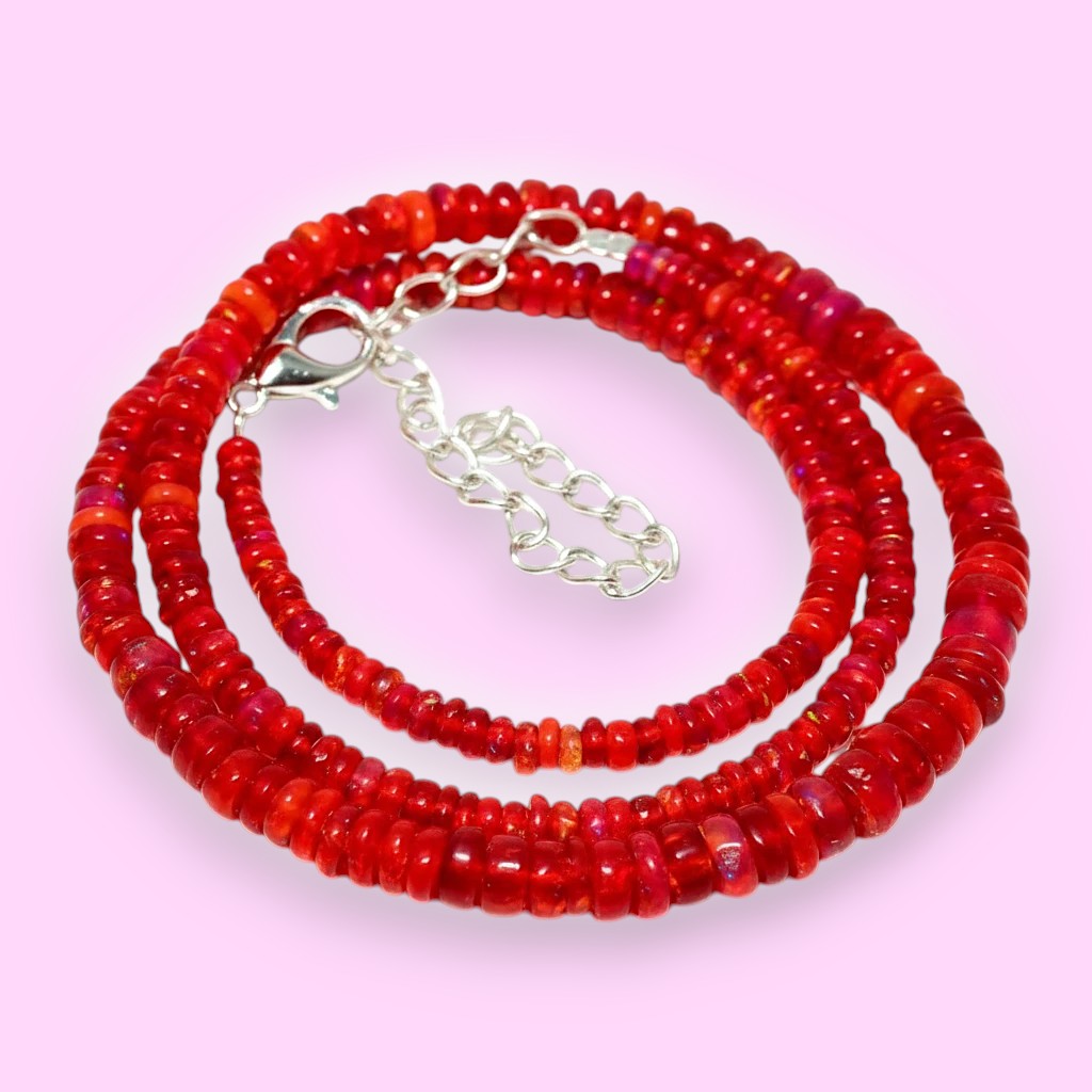 Ascendancy Gems handcrafted red Ethiopian Welo fire opal rondelle bead necklace with adjustable silver clasp.