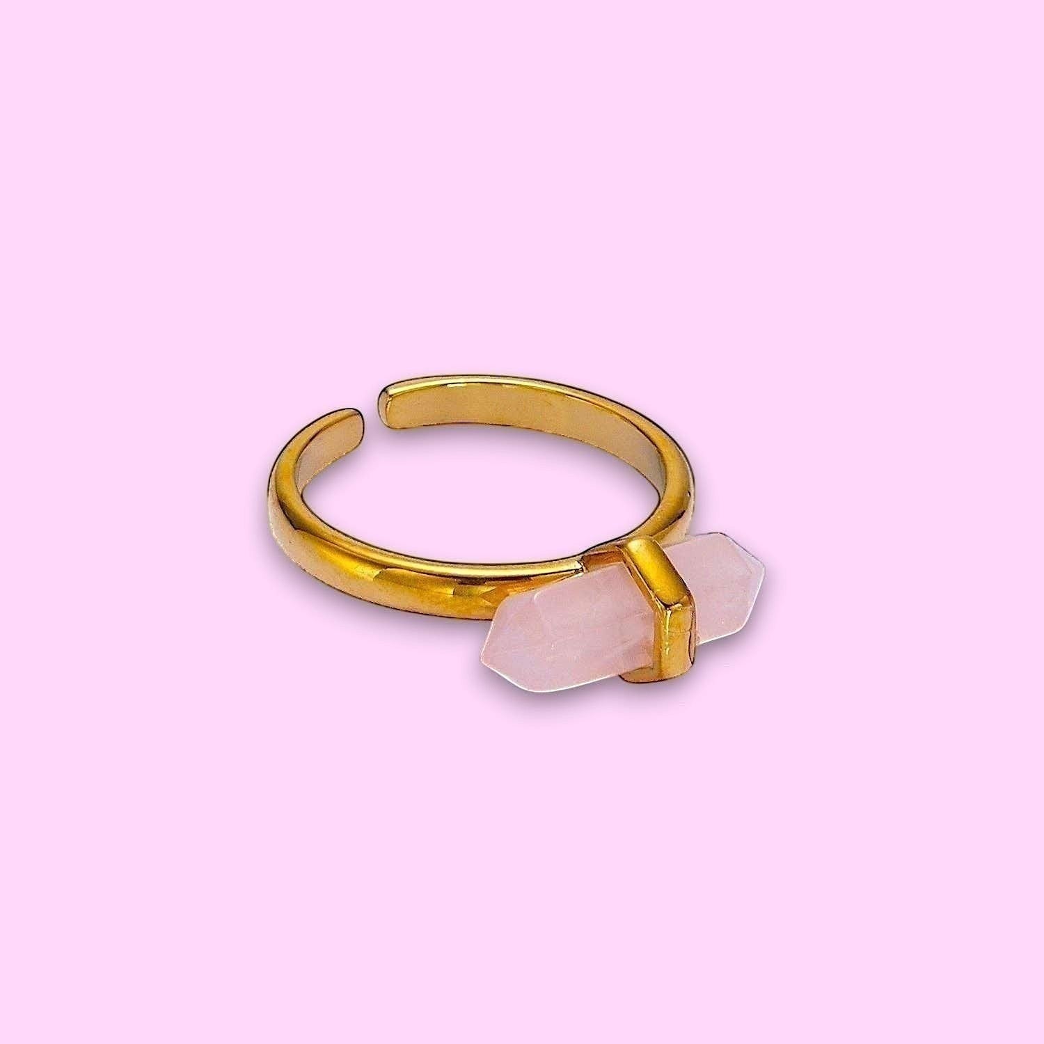 Ascendancy Gems adjustable gold-tone ring with a double-terminated rose quartz crystal.