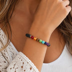 Ascendancy Gems Shakra Lava bead bracelet with 7 chakra colored gemstones and black lava stones. Stretch fit.